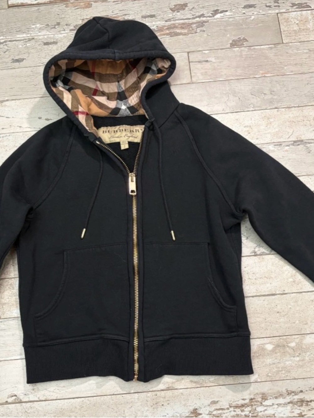 Woman’s Burberry Black Hooded Zip Jacket with Iconic Check Lining